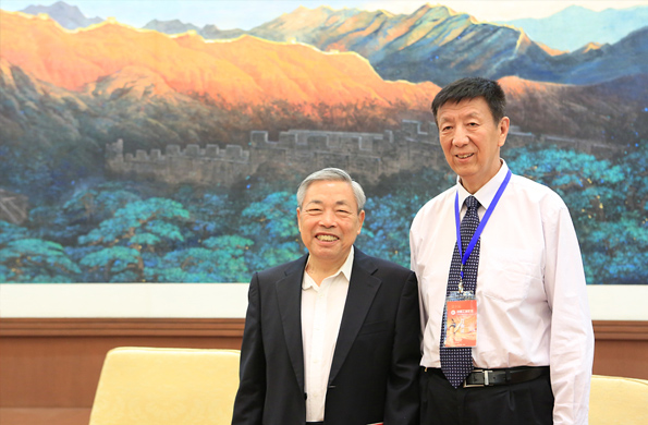 Chairman Yang Cheng and Vice Chairman of CFIE Ji Mingbo (first right)